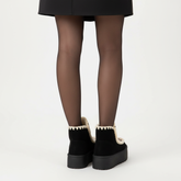 Botines vaca - Vista posterior falda